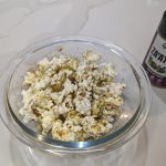 zaatar popcorn in a glass bowl